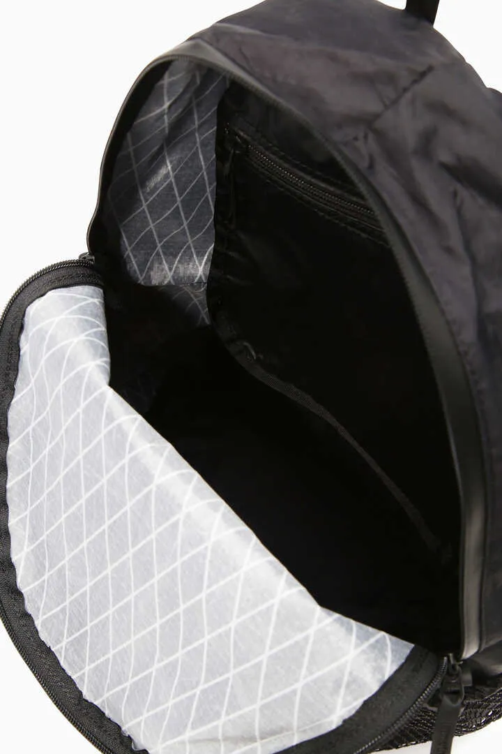 And Wander X-Pac 20L Daypack - Off White